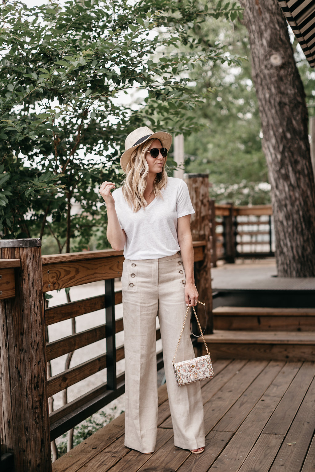 One Small Blonde | Brooke Burnett is wearing a basic white t-shirt and a wide leg sailor pants